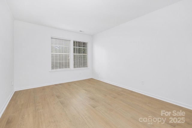 6523 Clavell Ln Unit I, Charlotte, NC 28210 - unfurnished room featuring light wood-style flooring and baseboards