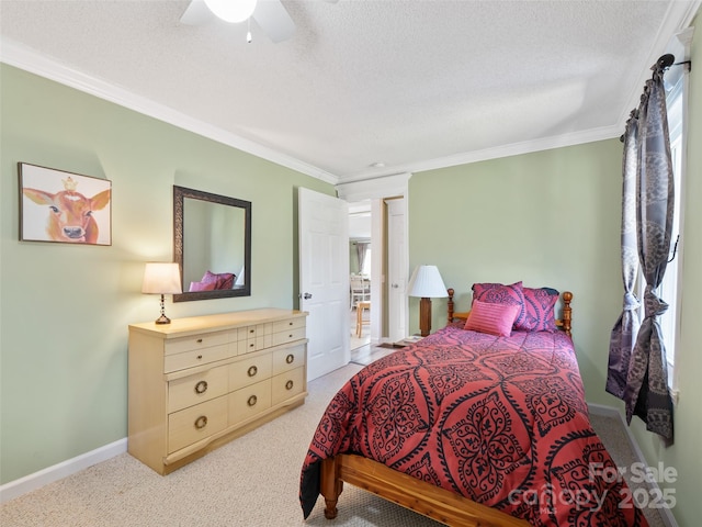 173 Odoms Chapel Rd, Bakersville, NC 28705 - bedroom with a textured ceiling, baseboards, light colored carpet, ceiling fan, and crown molding
