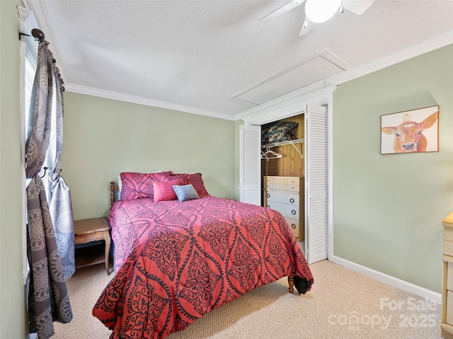 173 Odoms Chapel Rd, Bakersville, NC 28705 - carpeted bedroom featuring attic access, a ceiling fan, crown molding, and a closet