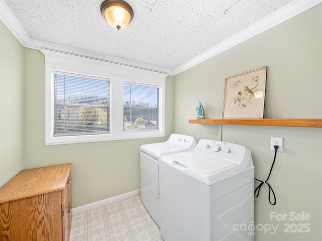 173 Odoms Chapel Rd, Bakersville, NC 28705 - washroom featuring light floors, laundry area, ornamental molding, washing machine and dryer, and baseboards