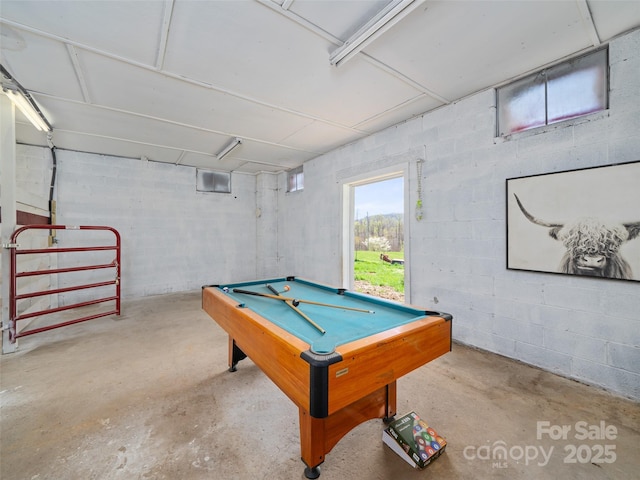 173 Odoms Chapel Rd, Bakersville, NC 28705 - recreation room with unfinished concrete floors, billiards, and concrete block wall