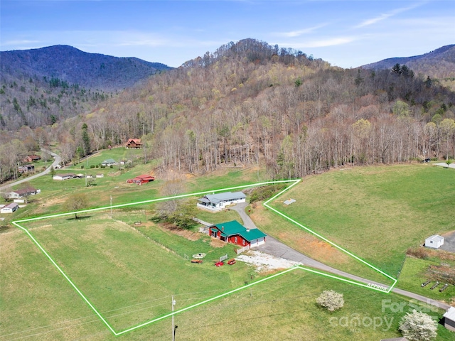 173 Odoms Chapel Rd, Bakersville, NC 28705 - aerial view featuring a rural view, a mountain view, and a wooded view