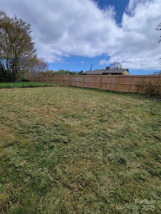 view of yard with fence