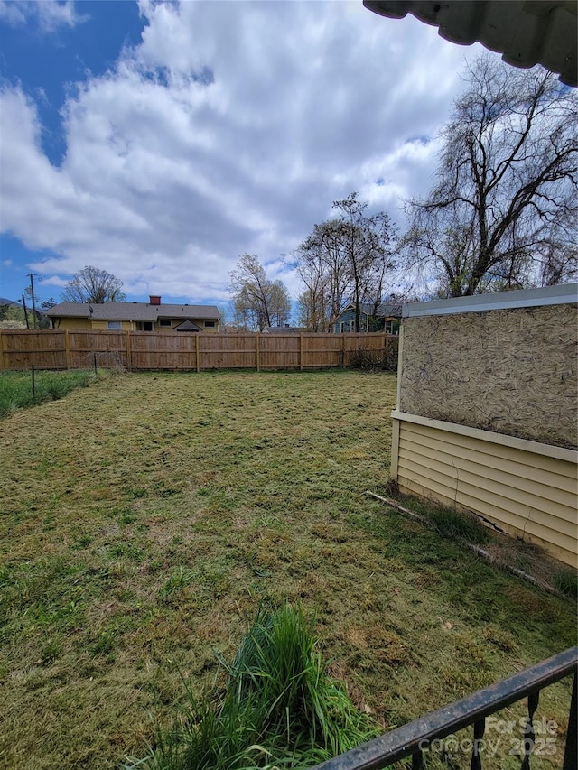view of yard with fence