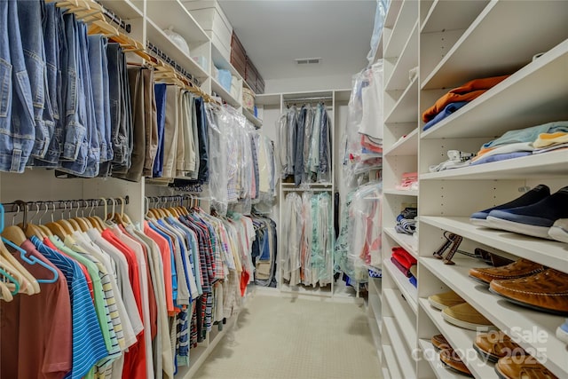 spacious closet featuring visible vents
