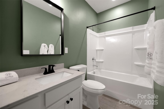 full bathroom with shower / bath combination, tile patterned floors, vanity, and toilet