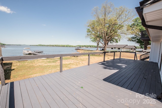 451 S Strand Dr, Norwood, NC 28128 - wooden deck with a yard and a water view