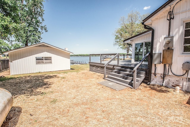 451 S Strand Dr, Norwood, NC 28128 - view of yard with a deck with water view