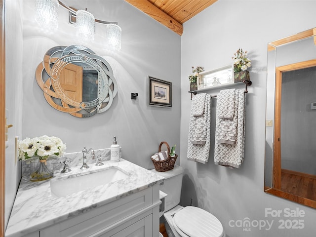 half bath with toilet and vanity