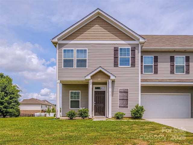 14727 Choate Cir Unit 2, Charlotte, NC 28273 - view of front facade with an attached garage, driveway, and a front yard