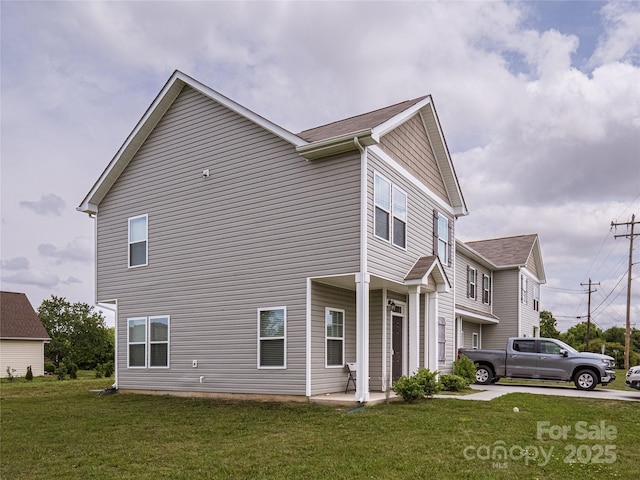14727 Choate Cir Unit 2, Charlotte, NC 28273 - view of home's exterior featuring a yard