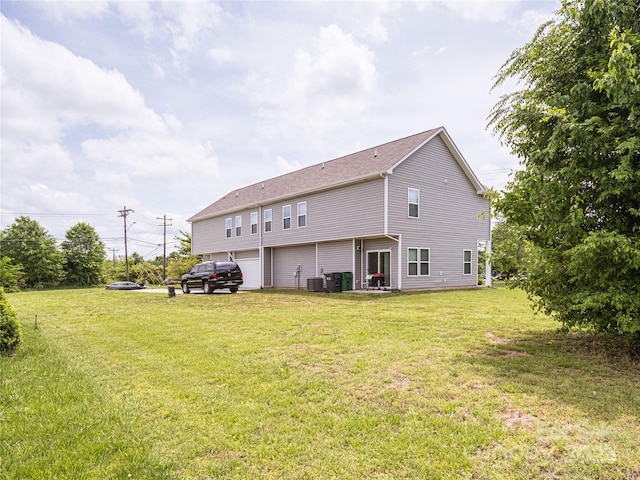 14727 Choate Cir Unit 2, Charlotte, NC 28273 - rear view of house with a yard and central AC