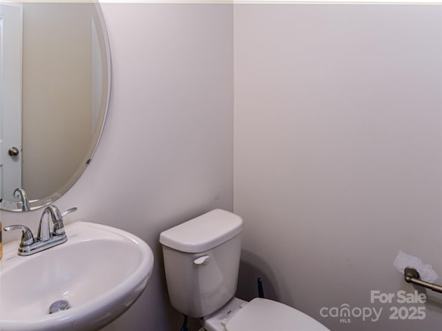 14727 Choate Cir Unit 2, Charlotte, NC 28273 - bathroom featuring toilet and a sink