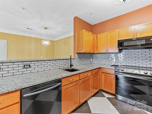 kitchen featuring stainless steel appliances, visible vents, a sink, and backsplash