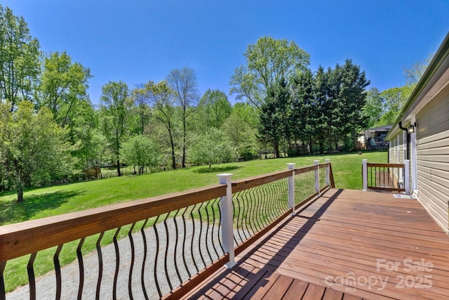 2942 Denwood Dr, Claremont, NC 28610 - wooden terrace featuring a yard