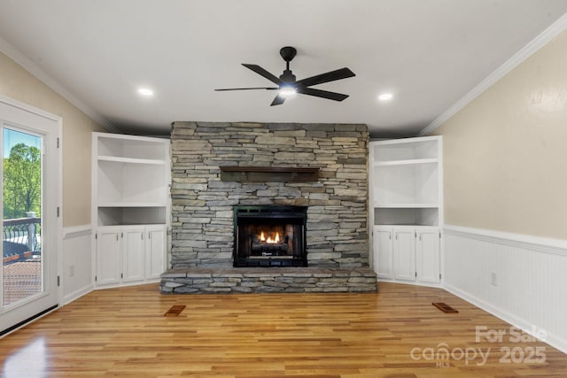 2942 Denwood Dr, Claremont, NC 28610 - unfurnished living room with wood finished floors, a ceiling fan, and ornamental molding