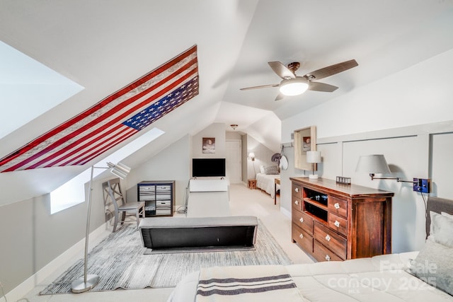 bedroom featuring ceiling fan, carpet, and lofted ceiling