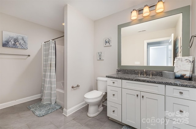 full bath featuring tile patterned flooring, toilet, vanity, and baseboards