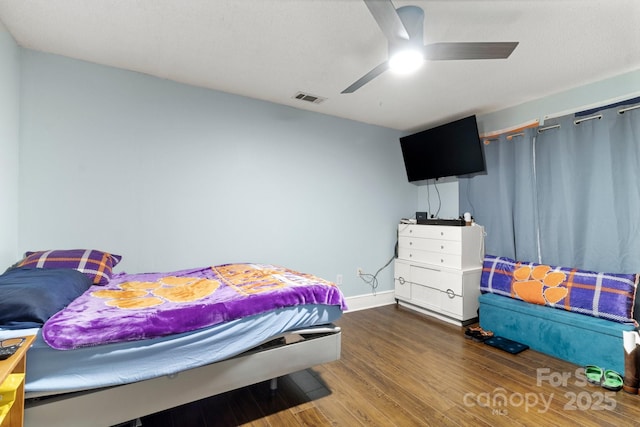 814 Columbia Dr, Chester, SC 29706 - bedroom featuring wood finished floors, ceiling fan, and baseboards