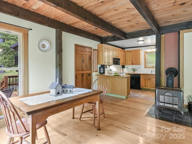 dining space with light wood-style floors, wood ceiling, beamed ceiling, and a wood stove