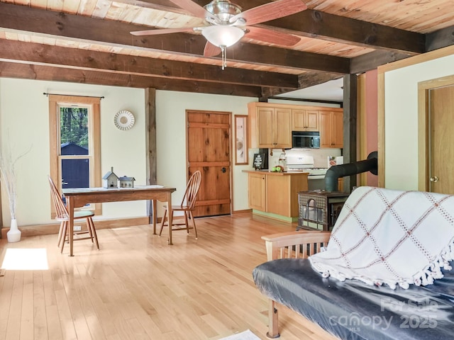 living area featuring a ceiling fan, baseboards, wooden ceiling, light wood-type flooring, and beamed ceiling