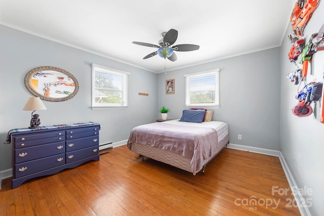 1307 Armstrong Rd, Belmont, NC 28012 - bedroom featuring multiple windows, hardwood / wood-style floors, ornamental molding, and baseboards