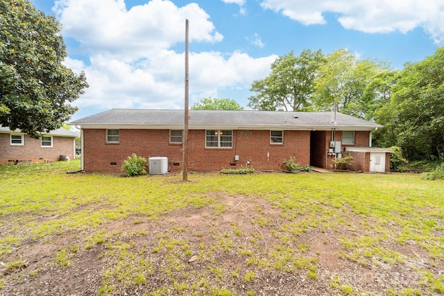 1307 Armstrong Rd, Belmont, NC 28012 - back of house featuring a yard, crawl space, brick siding, and central AC