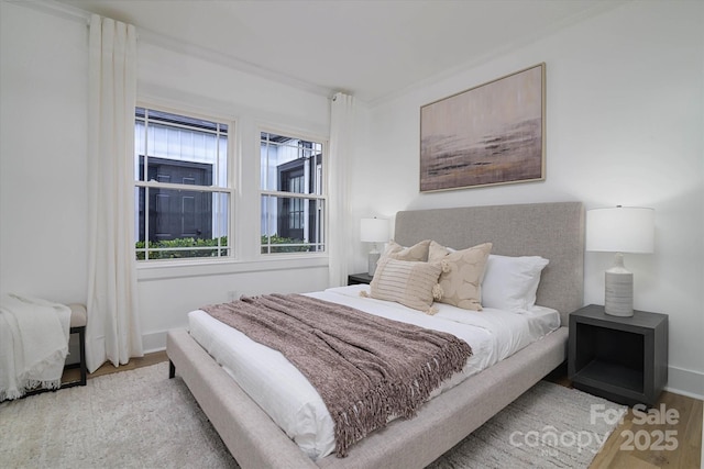 2138 Revolution Park Dr, Charlotte, NC 28208 - bedroom with wood finished floors and baseboards