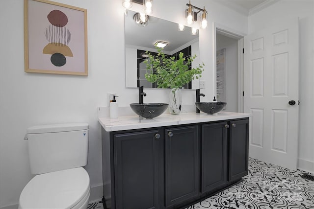 2138 Revolution Park Dr, Charlotte, NC 28208 - bathroom featuring double vanity and crown molding