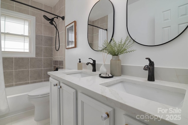 2138 Revolution Park Dr, Charlotte, NC 28208 - bathroom featuring double vanity and shower / bath combo