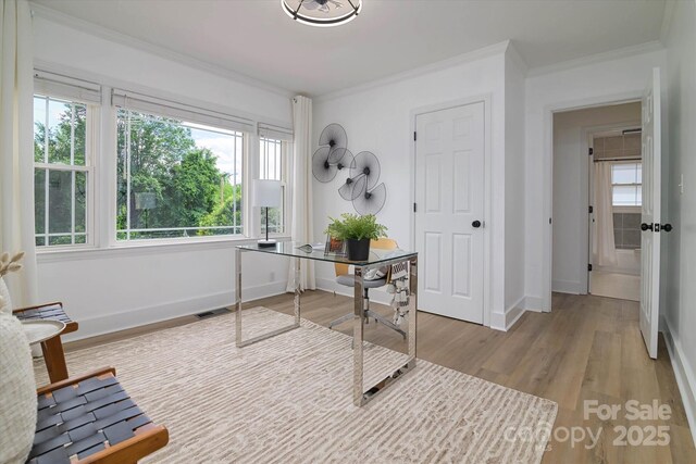2138 Revolution Park Dr, Charlotte, NC 28208 - office space with ornamental molding and light wood-style flooring