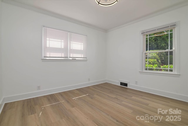 2138 Revolution Park Dr, Charlotte, NC 28208 - spare room featuring crown molding and wood finished floors