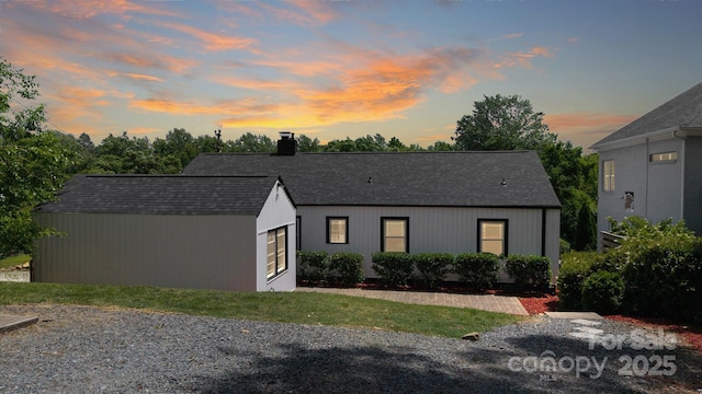 2138 Revolution Park Dr, Charlotte, NC 28208 - view of front of property with a shingled roof and a chimney