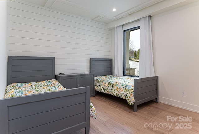bedroom featuring light wood-style flooring, beam ceiling, baseboards, recessed lighting, and coffered ceiling