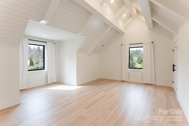 bonus room featuring wood ceiling, light wood-style flooring, and a wealth of natural light
