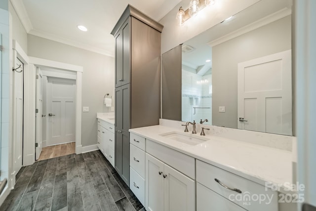 365 Delburg St, Davidson, NC 28036 - full bathroom with a stall shower, ornamental molding, vanity, and wood finished floors