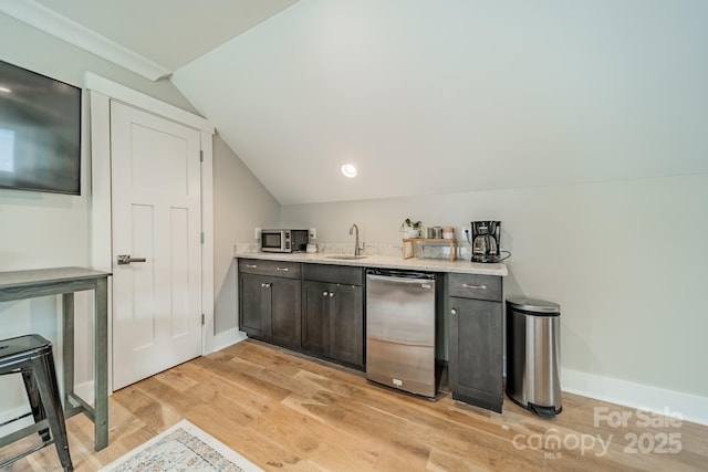 365 Delburg St, Davidson, NC 28036 - indoor wet bar with appliances with stainless steel finishes, light wood finished floors, lofted ceiling, baseboards, and ornamental molding