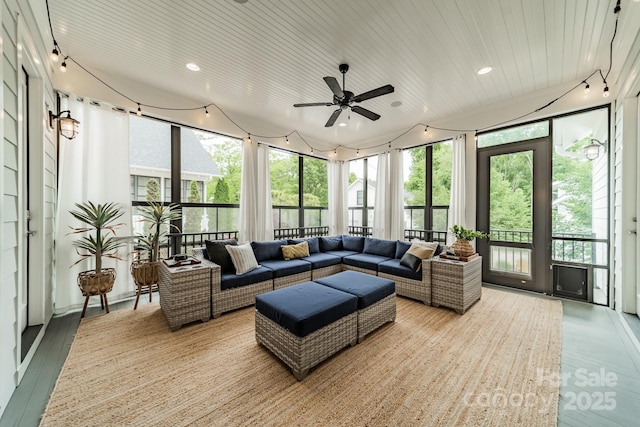 365 Delburg St, Davidson, NC 28036 - sunroom with floor to ceiling windows, a wooden deck, and wood finished floors
