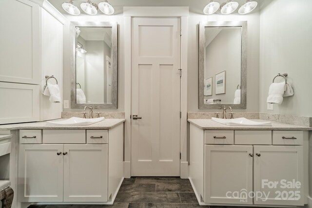 365 Delburg St, Davidson, NC 28036 - full bath with two vanities and wood finished floors