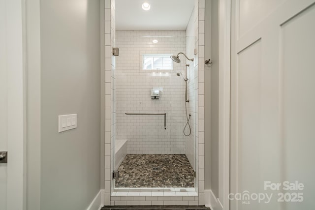 365 Delburg St, Davidson, NC 28036 - bathroom featuring a shower stall, baseboards, and recessed lighting