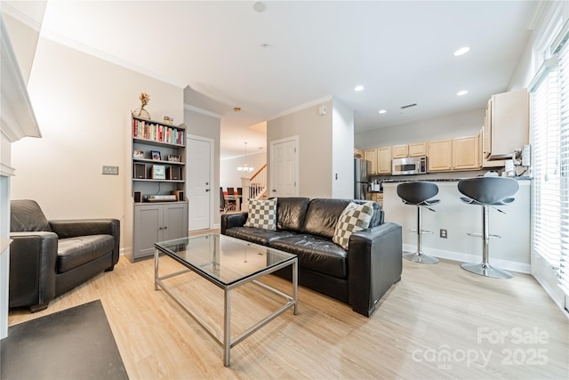 984 Park Slope Dr, Charlotte, NC 28209 - living room with light wood-type flooring, ornamental molding, stairs, recessed lighting, and baseboards