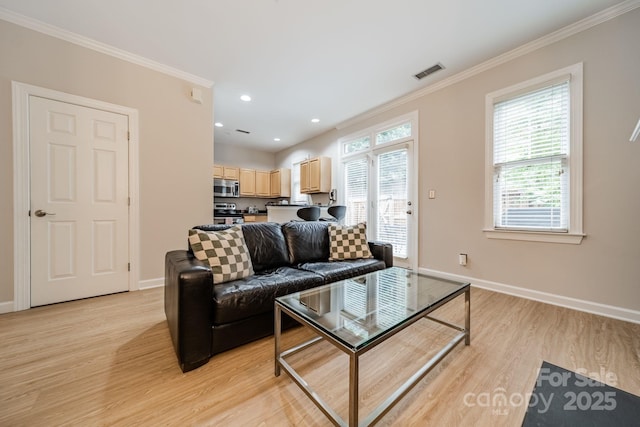 984 Park Slope Dr, Charlotte, NC 28209 - living area featuring crown molding, light wood-style floors, baseboards, and recessed lighting