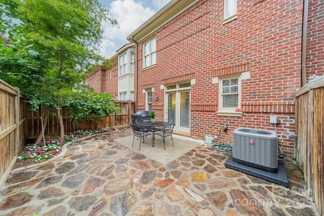 984 Park Slope Dr, Charlotte, NC 28209 - fenced backyard with central AC unit, a patio, and a grill