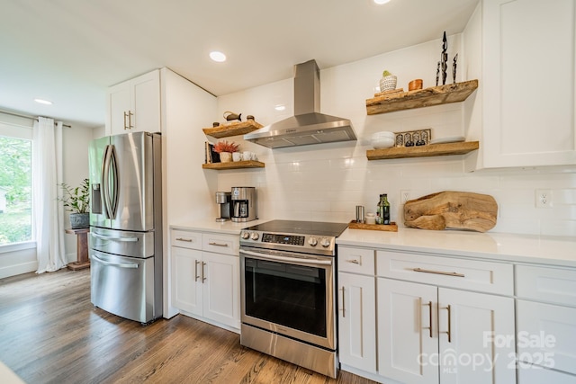 kitchen featuring open shelves, light wood-style flooring, island exhaust hood, and stainless steel appliances