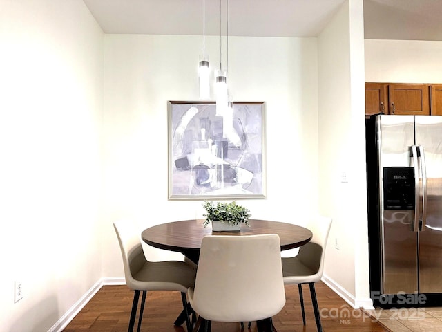 291 Brickton Village Cir Unit 106, Fletcher, NC 28732 - dining area featuring dark wood-type flooring and baseboards