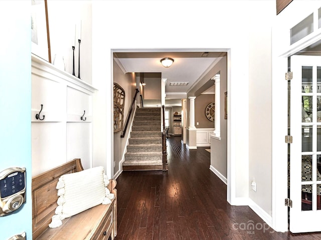 3057 Drummond Ave, Indian Land, SC 29707 - hall featuring visible vents, decorative columns, stairs, dark wood-style floors, and built in shelves