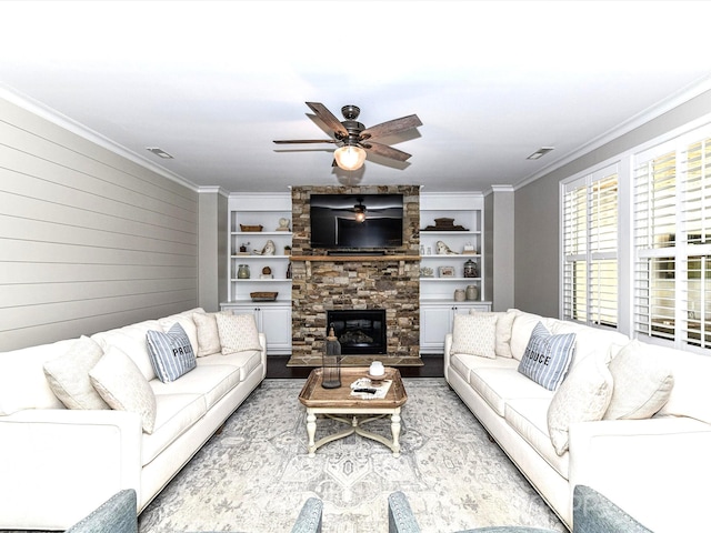 3057 Drummond Ave, Indian Land, SC 29707 - living area with ceiling fan, visible vents, crown molding, a fireplace, and built in shelves