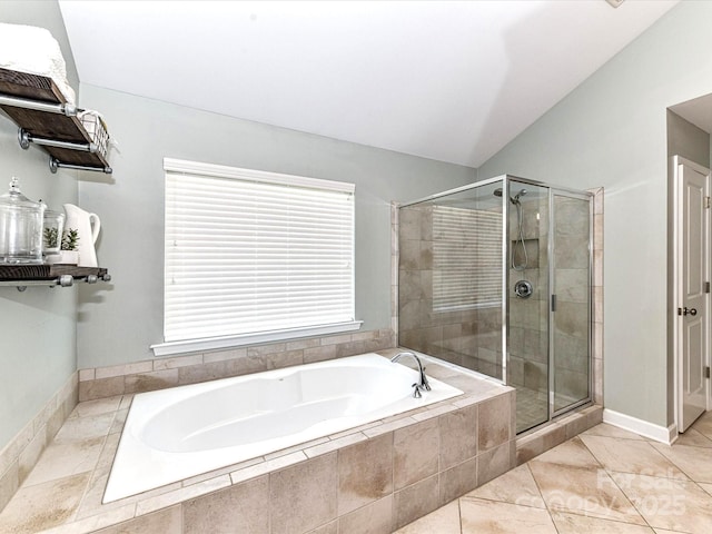 3057 Drummond Ave, Indian Land, SC 29707 - bathroom featuring lofted ceiling, a bath, and a stall shower