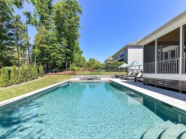 3057 Drummond Ave, Indian Land, SC 29707 - view of swimming pool with a sunroom, a pool with connected hot tub, a fenced backyard, and a patio area