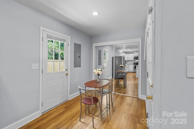 4009 Dunwoody Dr, Charlotte, NC 28215 - dining area featuring electric panel, wood finished floors, baseboards, and recessed lighting